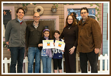 L to R: Trevor Smith, & Jon Hoffman from Community Human Services, Griffin, Annie, and Jen and Tom Straw