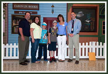 Brendan with proud parents Tom and Patricia, and Mikie with proud mom Sheri and O'Hara Principal Dr. Mike Rowe