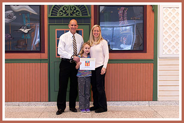 Allie with proud parents John and Shannon Watters