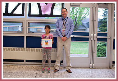 Zehra with Principal Michael Rowe